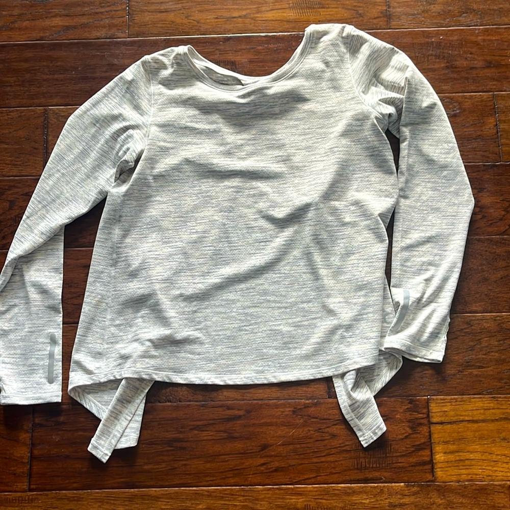 Zyia open back/tie long sleeve.